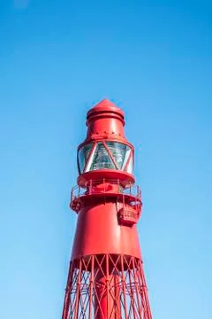 A red lighthouse. Stock Photos
