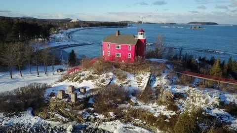 Red lighthouse on point Stock Footage 85589444