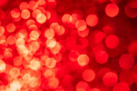 Red lights abstract bokeh backdrop. Chrismas or valentine's day lights bokeh. Stock Photos