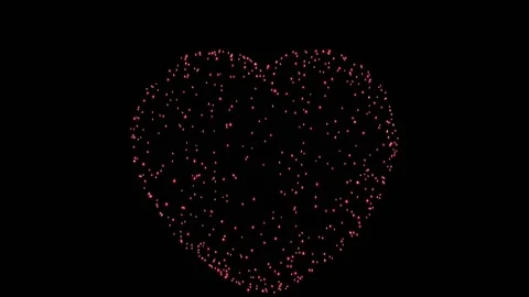 The red lights of the fireworks flash in the shape of a heart against a black Stock Footage 156311604