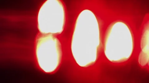 Red lights over lens Stockbeeldmateriaal 75427805