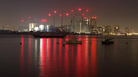 Red lights reflected in the Thames Stock Photos