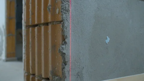 Red line of a marking on a wall surface Stock-Footage 114570798