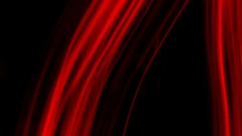 Red lines of light on a black background Stock Photos
