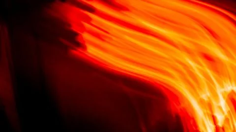 Red lines of light on a black background Stock Photos