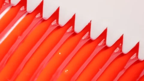 Red lip gloss background, macro texture, lipgloss waves Stock Footage 309937635