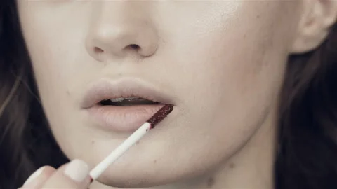 Red lip gloss. Stock Footage 120798926