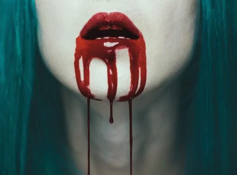 Red lips in blood Stock Photos