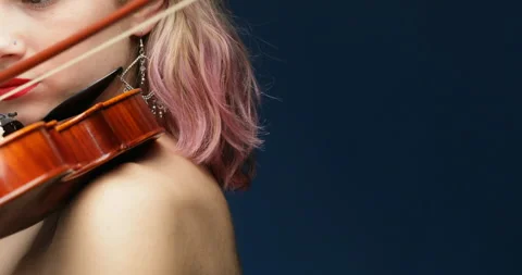 Red lips focus, music flows, backdrop blue Stock Footage 276639309