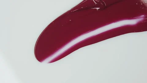 Red lipstick. Ink on white background Stock Footage 242759968
