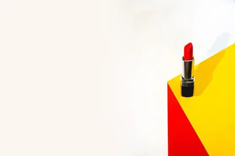 Red lipstick on a light background Stock Photos