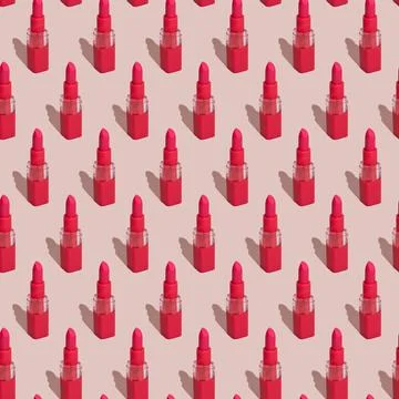 Red lipstick on pink seamless pattern. Lipsticks with shadow in rows. Stock Photos