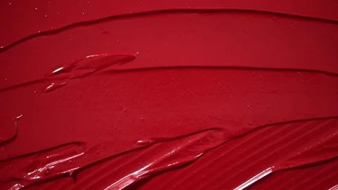 Red lipstick smeared in elegant, soft strokes texture. Stock Footage 310736109