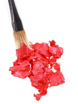 Red lipstick stroke (sample) with makeup brush, isolated on white Foto stock