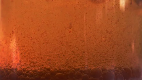 Red liquid with air bubbles Stock Footage 97940110