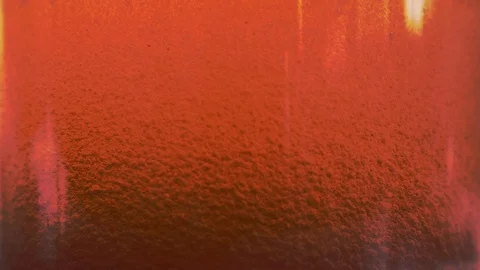 Red liquid with air bubbles Stock Footage 98060345