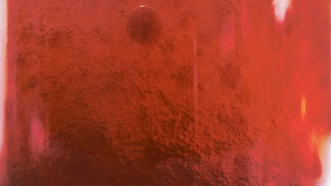 Red liquid with air bubbles Stock Footage 98060908