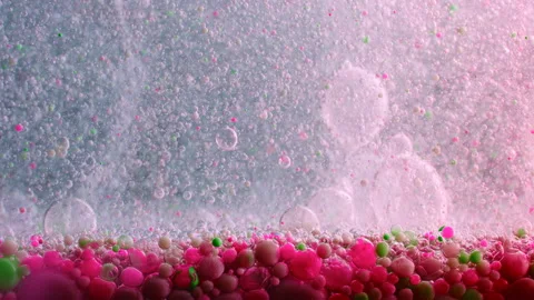 Red liquid blood background. Macro shot of various air bubbles. Stock Footage 146738464