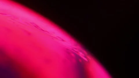 Red liquid, bubble in macro, movement of liquid in a bubble Stock Footage 278738325