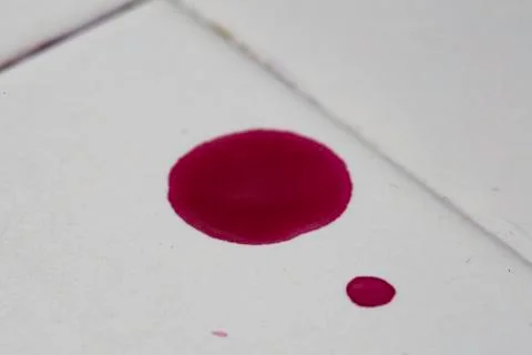 Red liquid drop, blood sample close up 스톡 사진