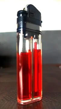Red Liquid Gas Lighter Stock Photos