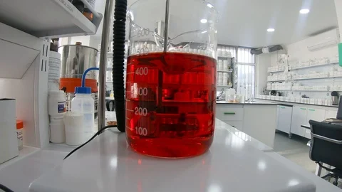 Red liquid in laboratory Stock Footage 101217911