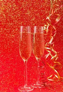 Red liquid splash with bubbles and foam on surface Stock Photos