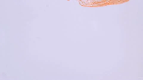 Red liquid splashing Stock Footage