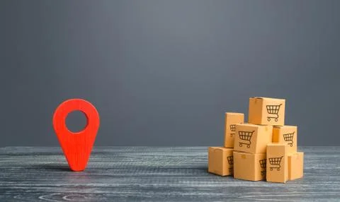 Red location pointer geolocation symbol and cardboard boxes. Distribution del Stock Photos