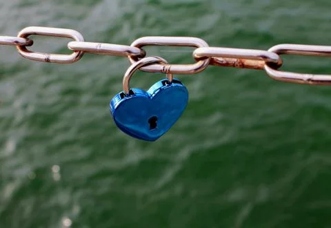 Red lock on the bridge. blue  castle Stock Photos
