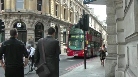 Red London Bus at Corner of Threadneedle Street London Stock Footage 53821810