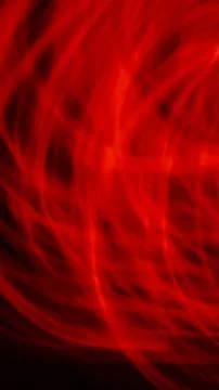 Red luminous lines on a black background Stock Illustration