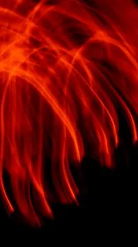 Red luminous lines on a black background Stock Illustration