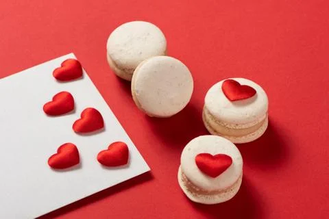 Red Macarons and red shaped hearten an envelope Stock Photos