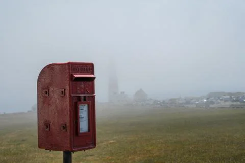 Red mailbox in misty background Stock Photos