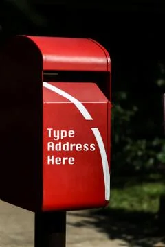 Red mailbox in the park Stock Photos