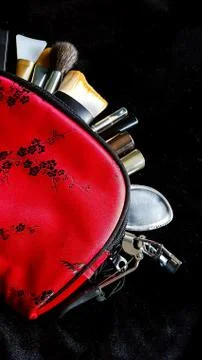 Red make up bag with brushes Stock Photos