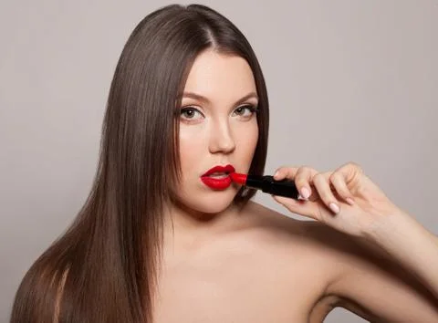 Red makes her lips so desirable Stock Photos