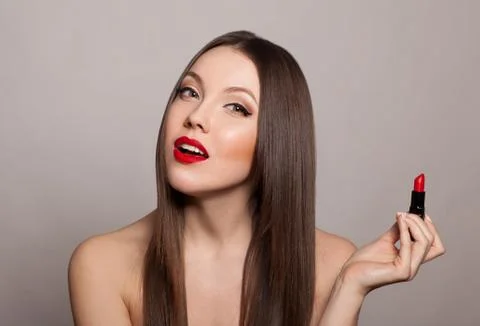 Red makes her lips so desirable Stock Photos