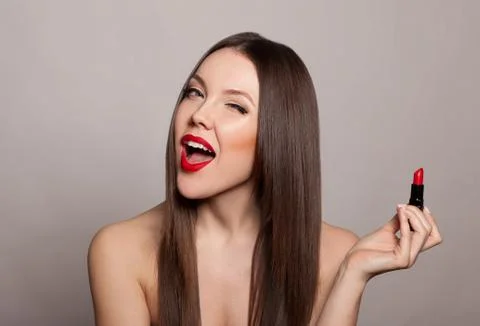 Red makes her lips so desirable Stock Photos