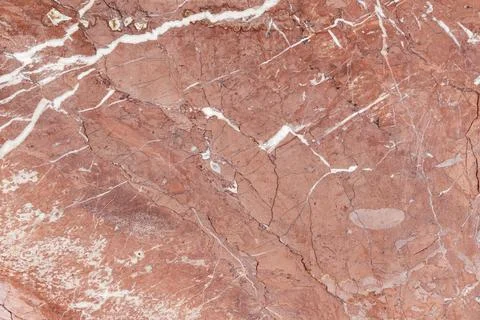 Red marble pattern with white veins. Close up photo texture Stock Photos