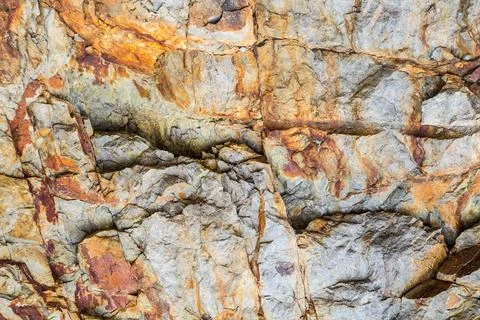 Red marble-rock close-up Stock Photos