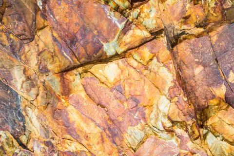 Red marble-rock close-up Stock Photos