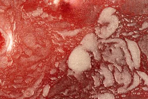 Red marbled texture with foamy patterns Photos
