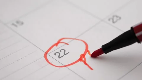Red marker circling date twenty two on calendar and writing pay tax words f.. Stock Footage 332263992