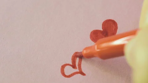 A red marker draw a heart. Valentine's Day Vídeo Stock 101061153