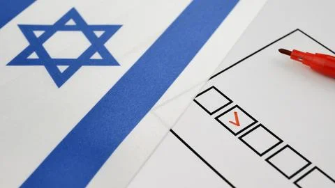 Red marker makes check next to candidates name on ballot Stock Photos