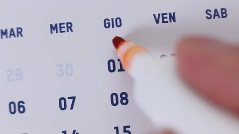 Red marker pen surrounding the date 1 on the calendar Stock Footage 155802754