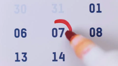 Red marker pen surrounding the date 7 on the calendar Stock Footage 155805748