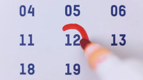 Red marker surrounding the date 12 on the calendar Stock Footage 155807582